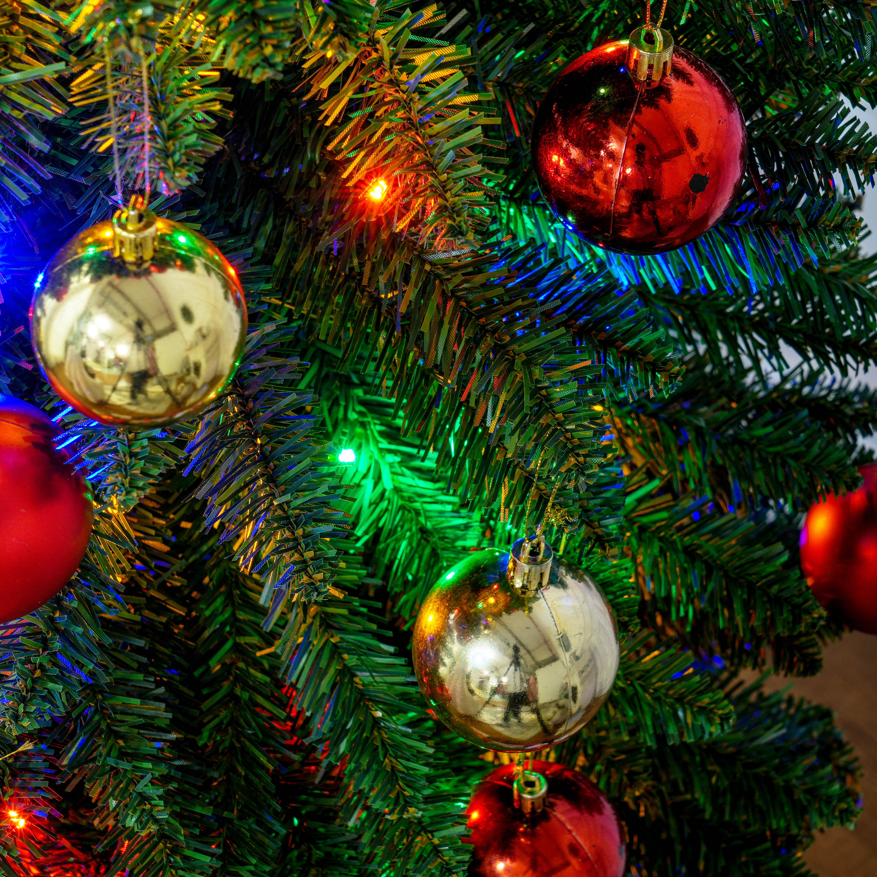 8ft Tall Pencil Prelit Artificial Christmas Tree Holiday Décor with 668 Branches, 250 Colorful LED Lights, Steel Base, Green