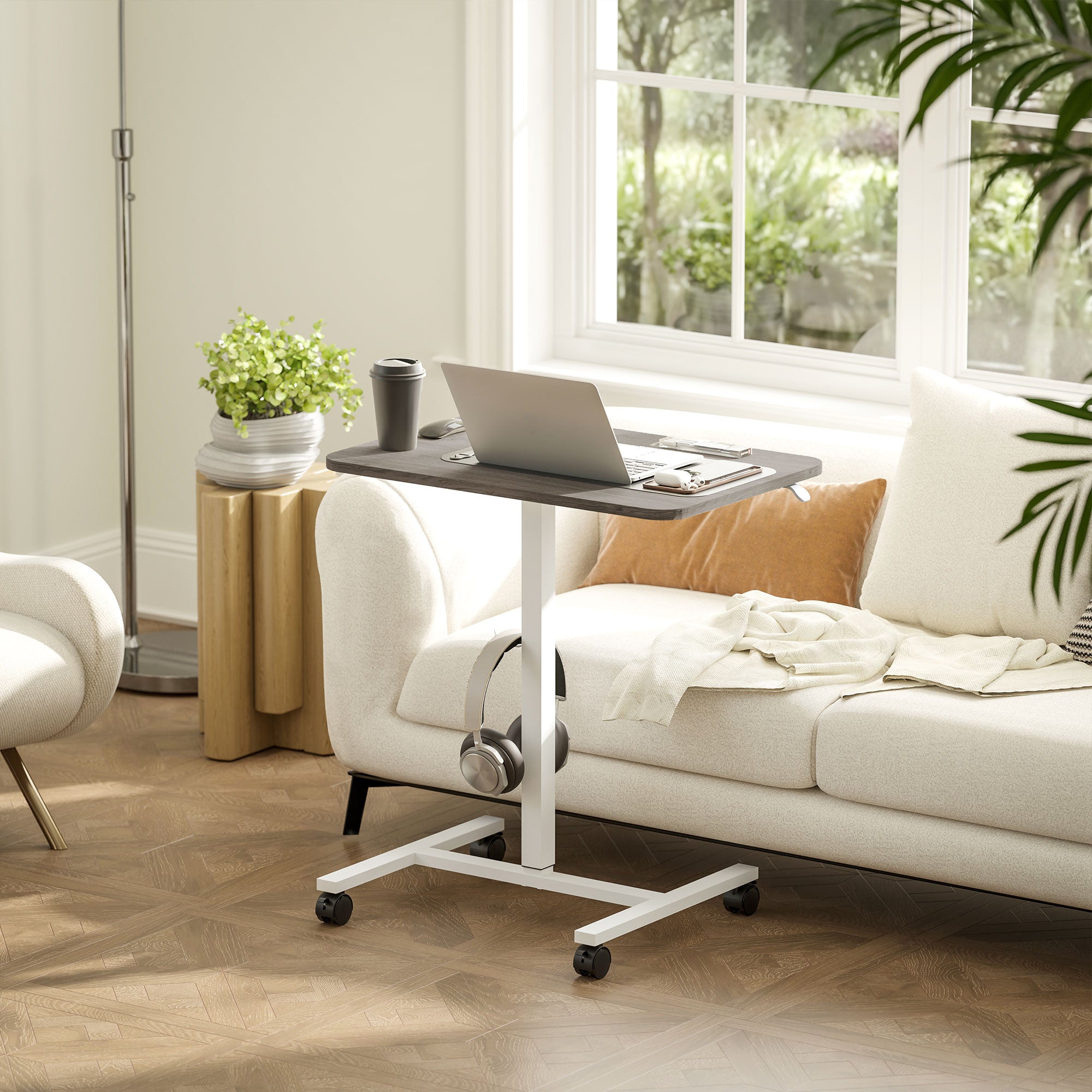 HOMCOM Height Adjustable Standing Desk, Pneumatic Sit Stand Desk for Laptop, Mobile Overbed Table with Wheels and Headphone Hook for Home Office, Grey